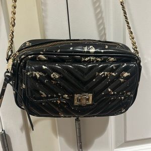 Steve Madden shoulder bag… 1 black and hold the other black and silver $75 each
